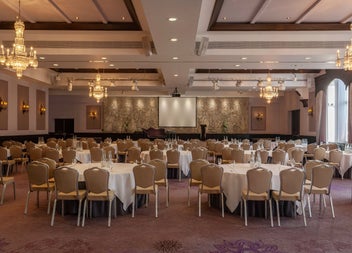 Function room with tables and chairs
