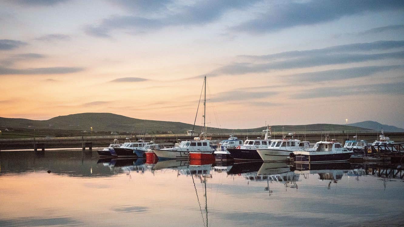 Boats docked in Portmagee Harbour in County Kerry.