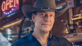 Robert Mizzell Dance - a gently smiling man in a large brown cowboy hat