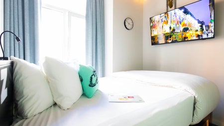 View of bedroom with TV