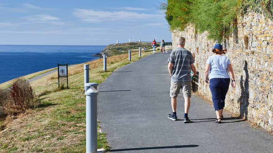People walking the Doneraile Walk in Tramore, County Waterford.