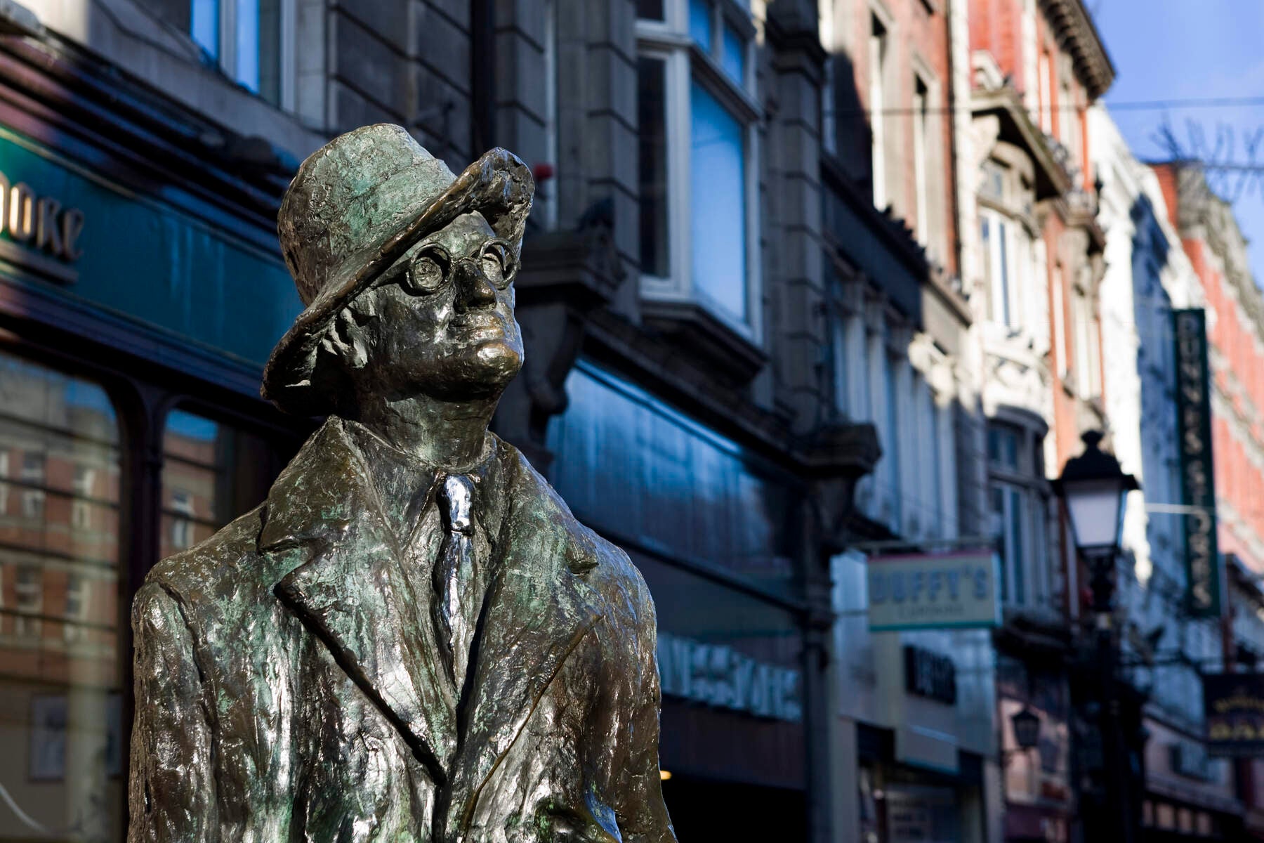 A bronze statue of the writer James Joyce on Earl street, Dublin city.