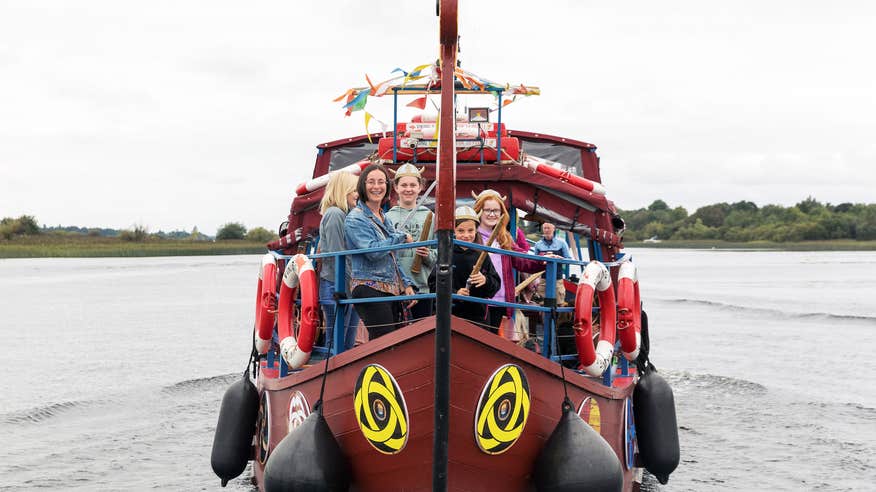 A group of people enjoying a Viking Tour on Lough Ree in Westmeath.