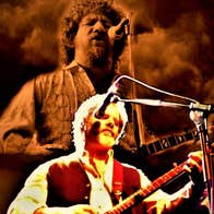Chris Kavanagh performs the music of Luke Kelly on stage with guitar