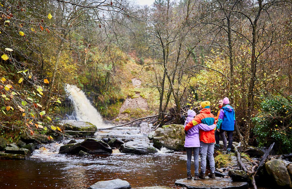 Hikers at Glebarrow Waterfall in the Slieve Bloom Mountains in Co Laois