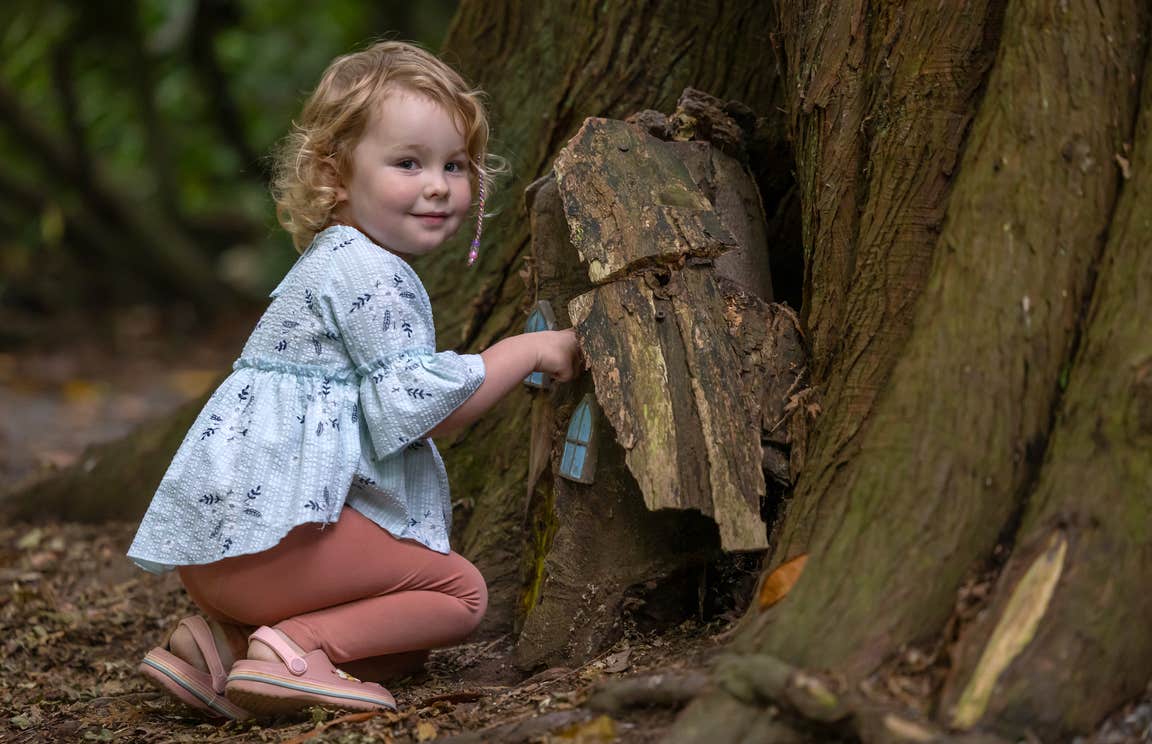 A little girl in the Fairy Garden in Belvedere House Gardens and Park in County Westmeath