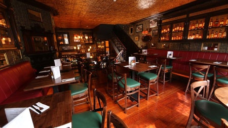 An interior view of The Oval table seating area