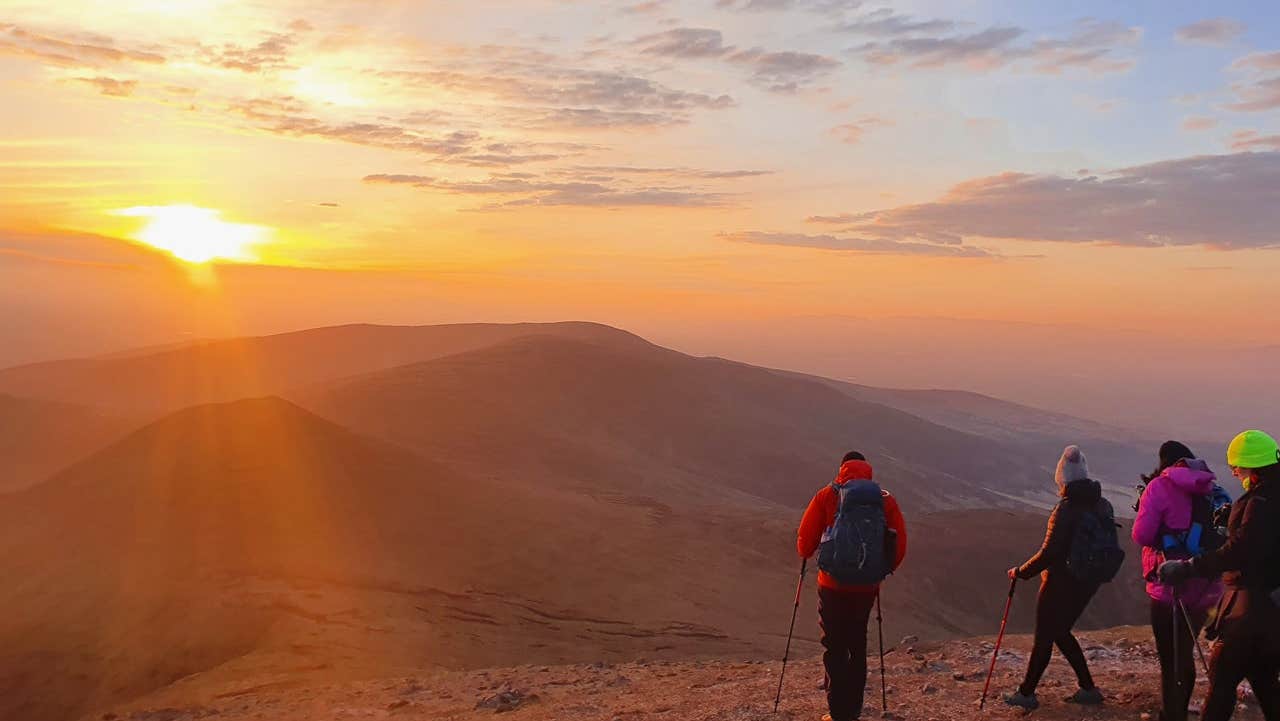 A guided sunrise hike at the top of the mountain