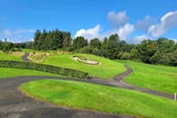 Situated in 300 acres of breathtaking parklands on the Carlow/Wexford border. The Jeff Howes designed championship course runs over 7,000 yards on the banks of the River Slaney & has a diversity of golf holes, rarely seen on one golf course