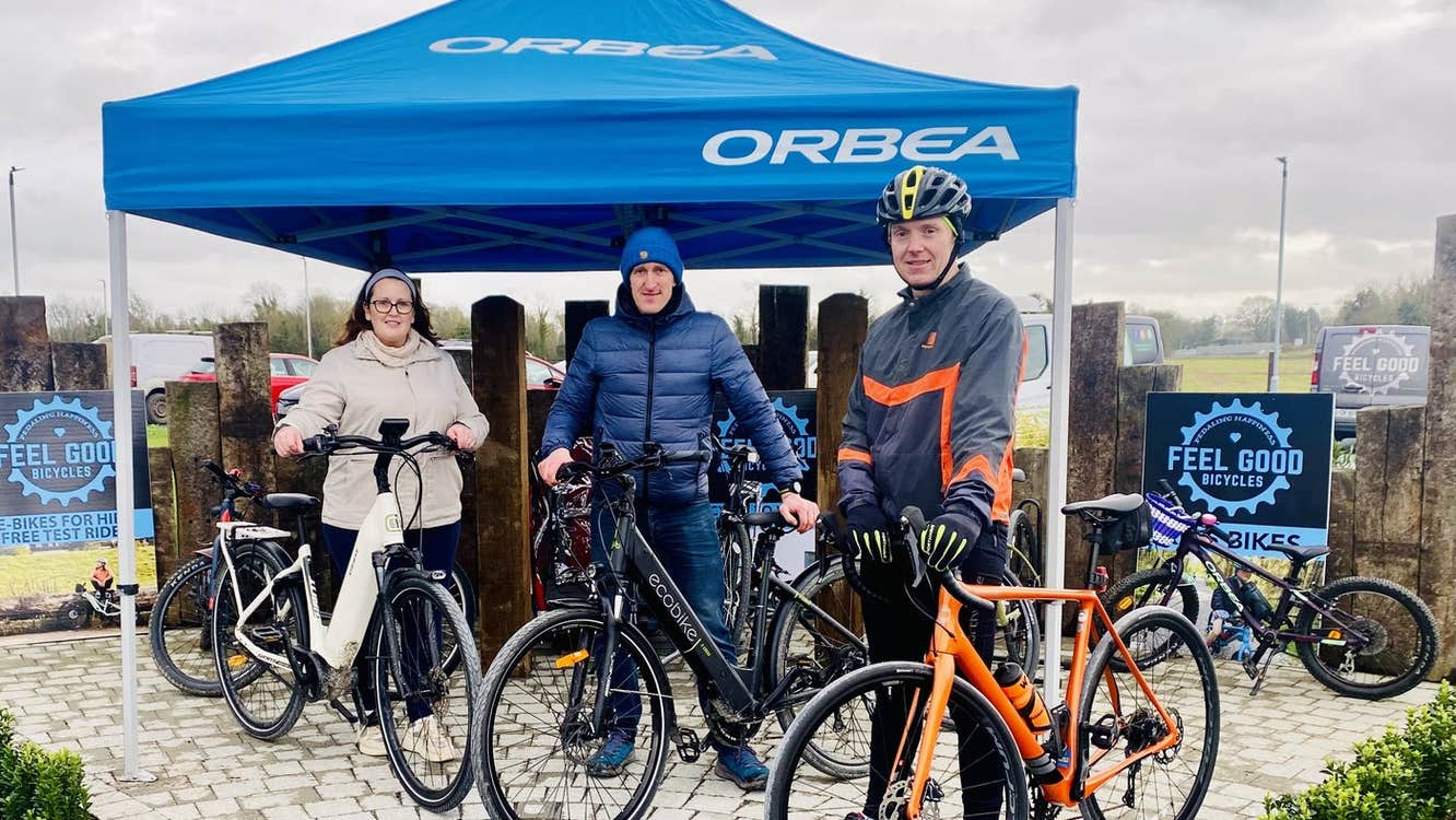Three people with their hired bikes posing for the camera