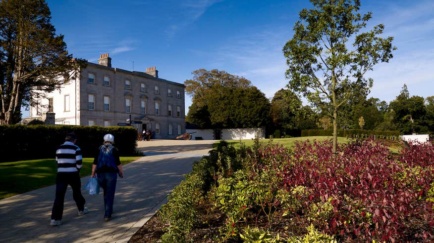 A couple walking up to Oldbridge House in Drogheda, County Meath