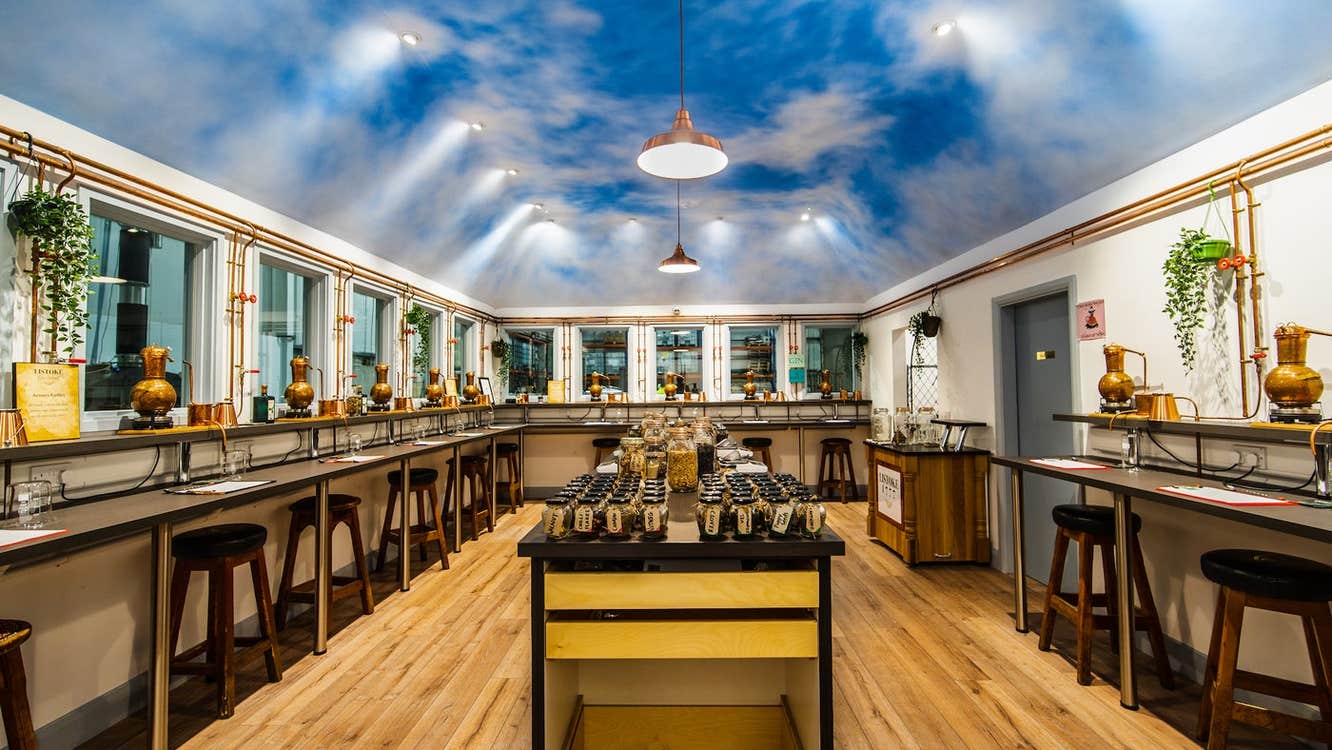 Interior of a gin school with rows of benches along the walls