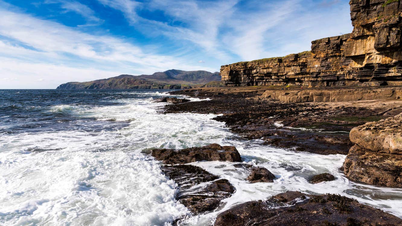 Waves crashing on the shore at Muckross Head.