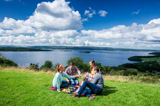 Four people enjoying a picnic at The Lookout Portroe Tipperary