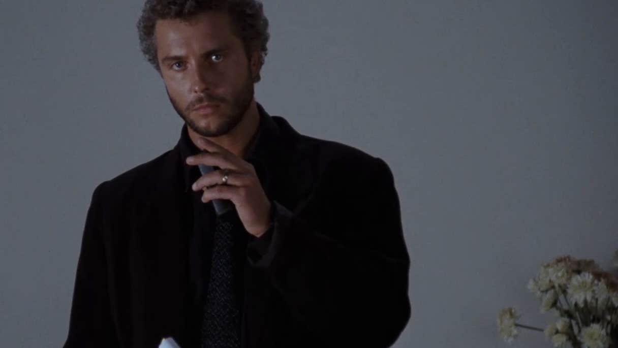 A man with a pensive expression.