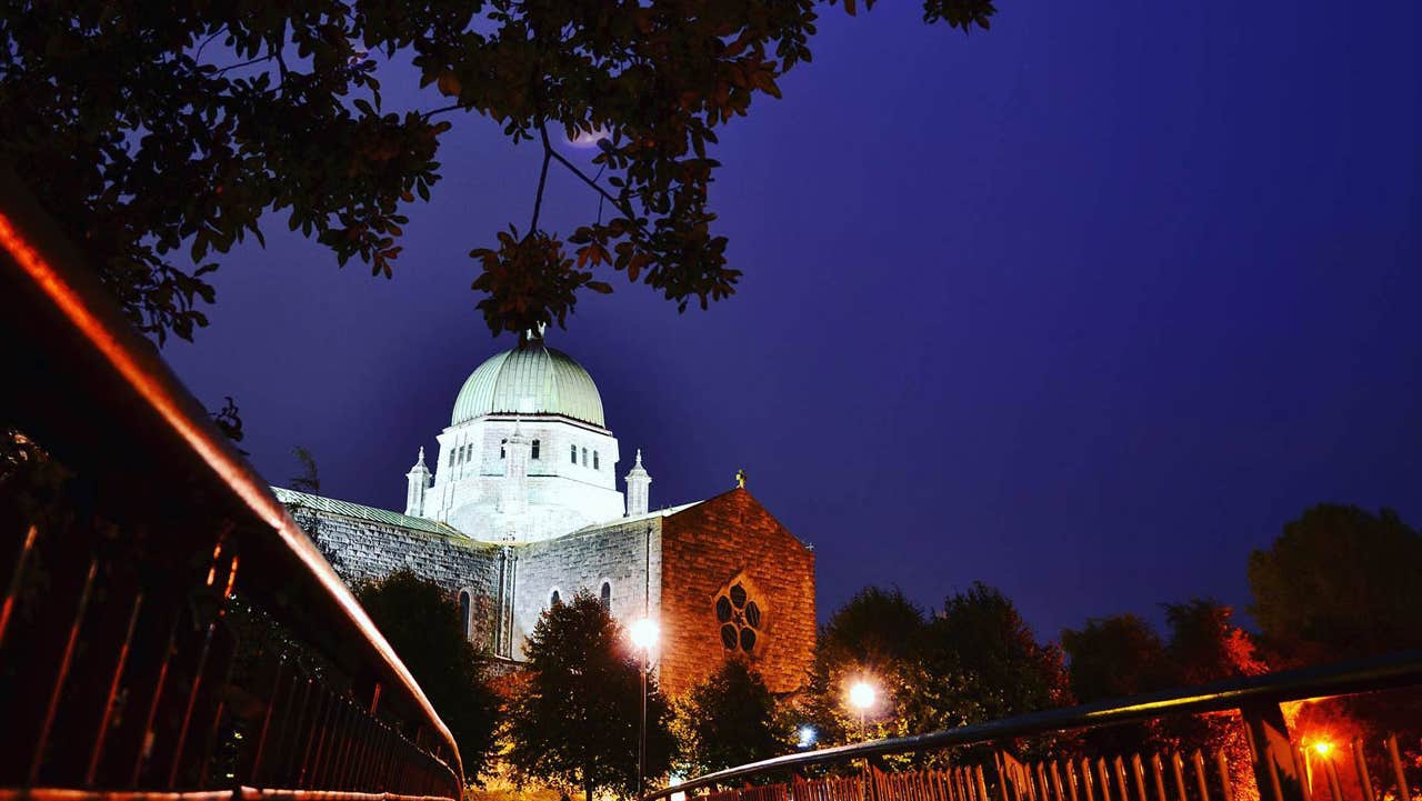 View over the bridge leading to the Galway Cathedral at night
