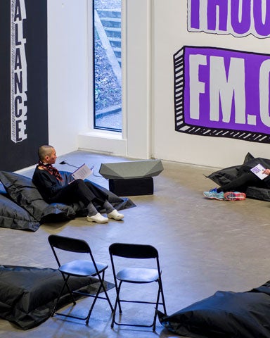 Artists preparing an exhibit at The Douglas Hyde Gallery of Contemporary Art