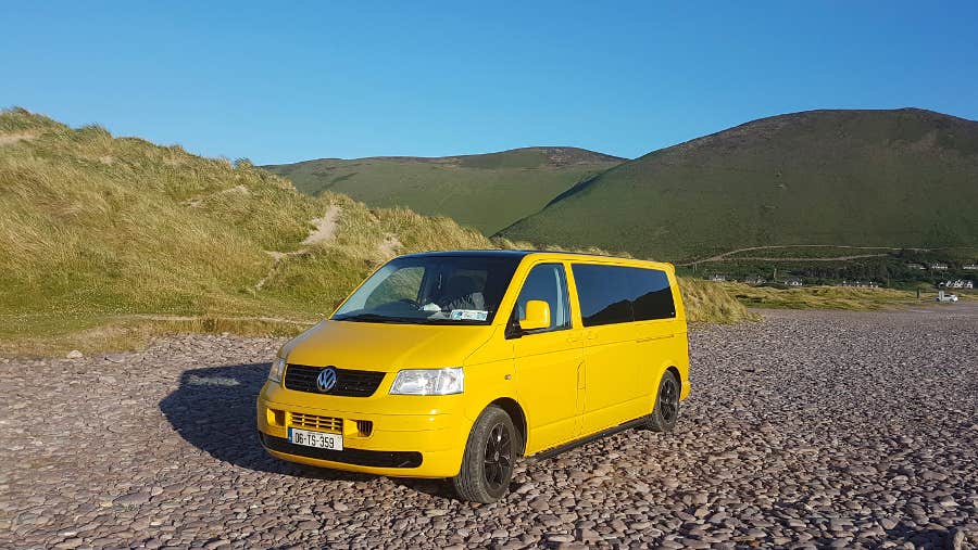 Yellow camper on beach