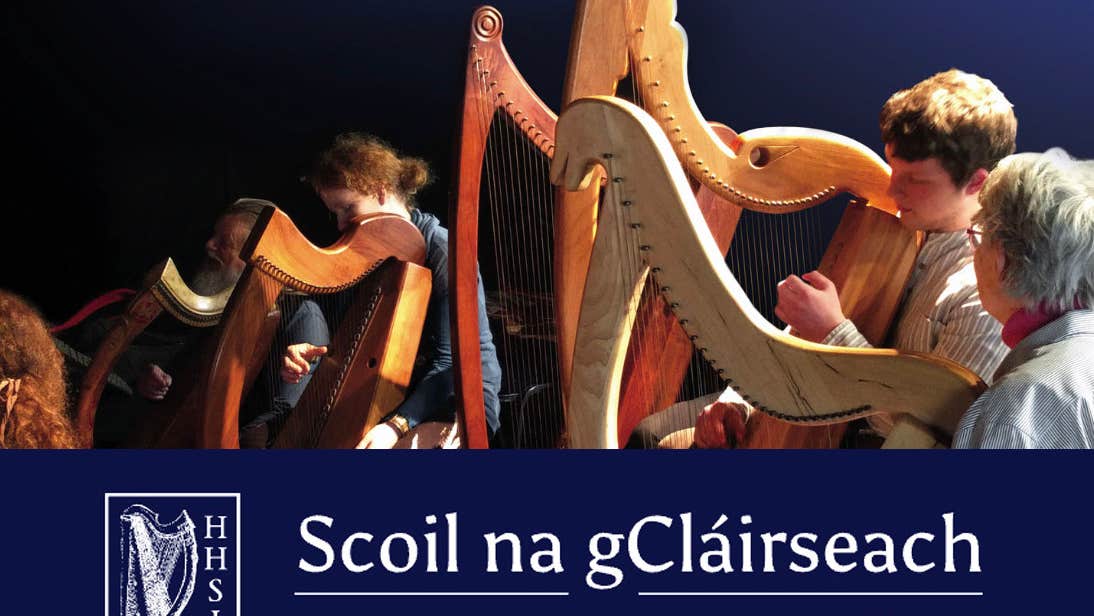 Line into the distance of people playing wooden harps, festival name and logo of a harp across the bottom in white text against dark background.