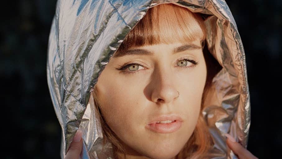 Brigit x District Gemma Dunleavy - headshot of woman wearing a silver hood