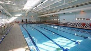 An indoor swimming pool with lane markings at Coral Leisure Arklow