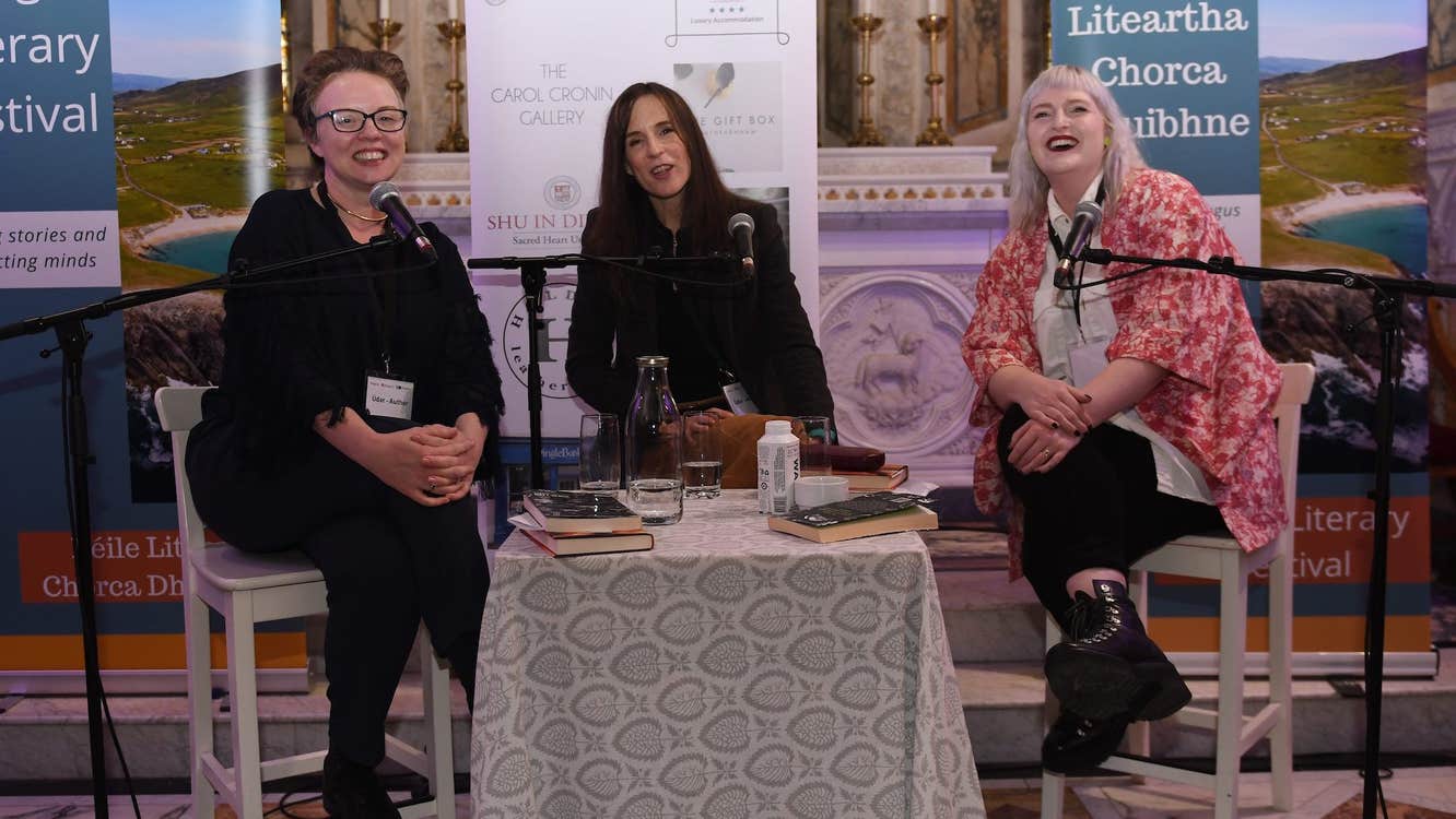 Belinda McKeon, novelist and Associate Professor of Creative Writing at Maynooth University, interviews authors Claire Kilroy and Sophie White in the Díseart Chapel (which features stained glass windows by Harry Clarke) at Dingle Lit 2023.