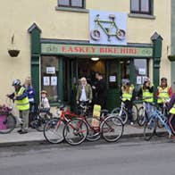 Image of cyclists outside Bike Hire Shop