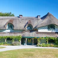 View of the front exterior of Swiss Cottage