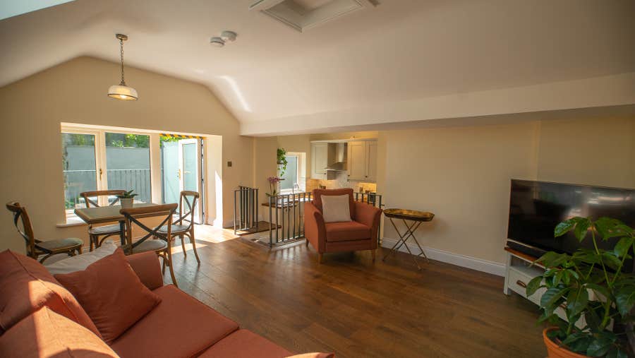 Sitting room with orange couches