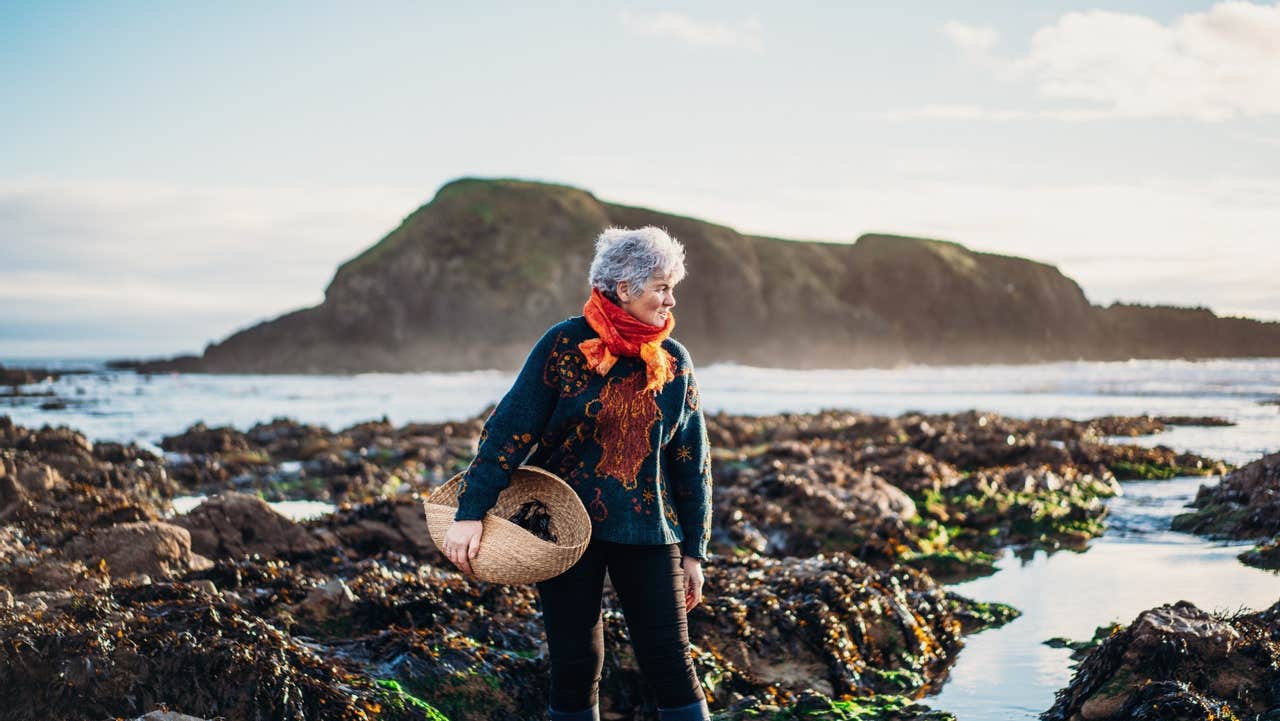 The Sea Gardener Marie Power holding a basket