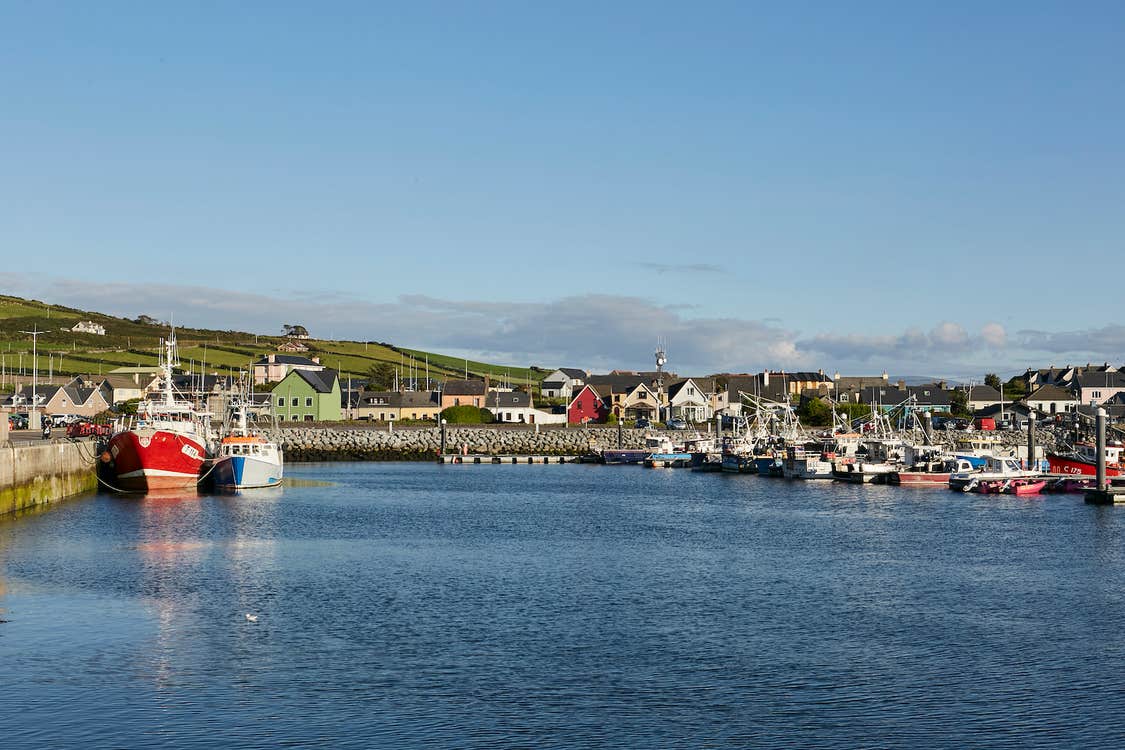 Fishing boats docked at Dingle Harbour in County Kerry.