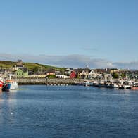 Fishing boats docked at Dingle Harbour in County Kerry.