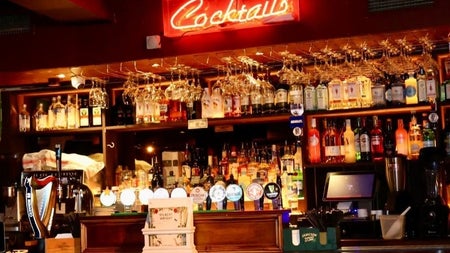 A view of the cocktail bar and lounge area at Gilbert & Wright, Malahide