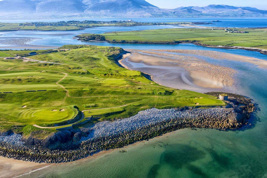 An aerial view of Tralee Golf Club golf course and surrounding coastal scenery