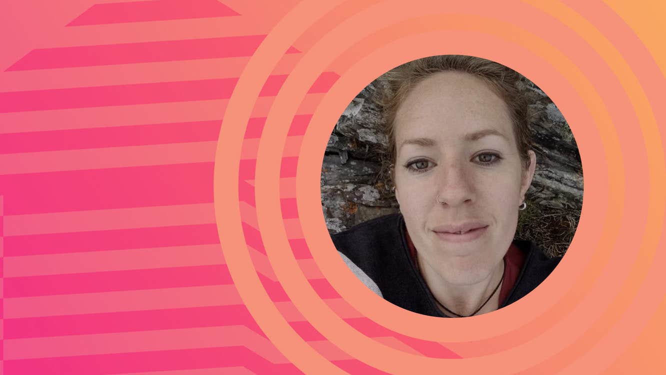 Small, round black and white photo of woman, smiling gently, surrounded by pale orange circles with pale pink stripes to the right.