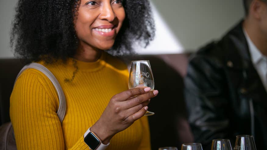 A woman on a tour of the Teeling Whiskey Distillery in Dublin city