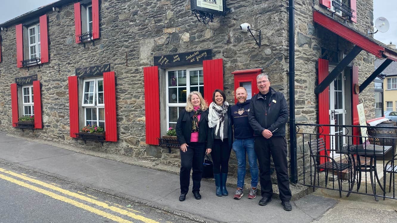 People standing outside Nancy's Barn pub in Ballyliffin County Donegal