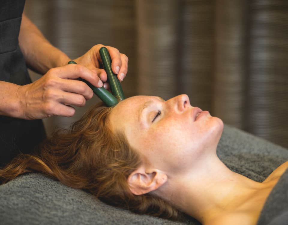 A lady receiving a Gaia facial treatment in the Ciúin Spa at the Slieve Russell Hotel