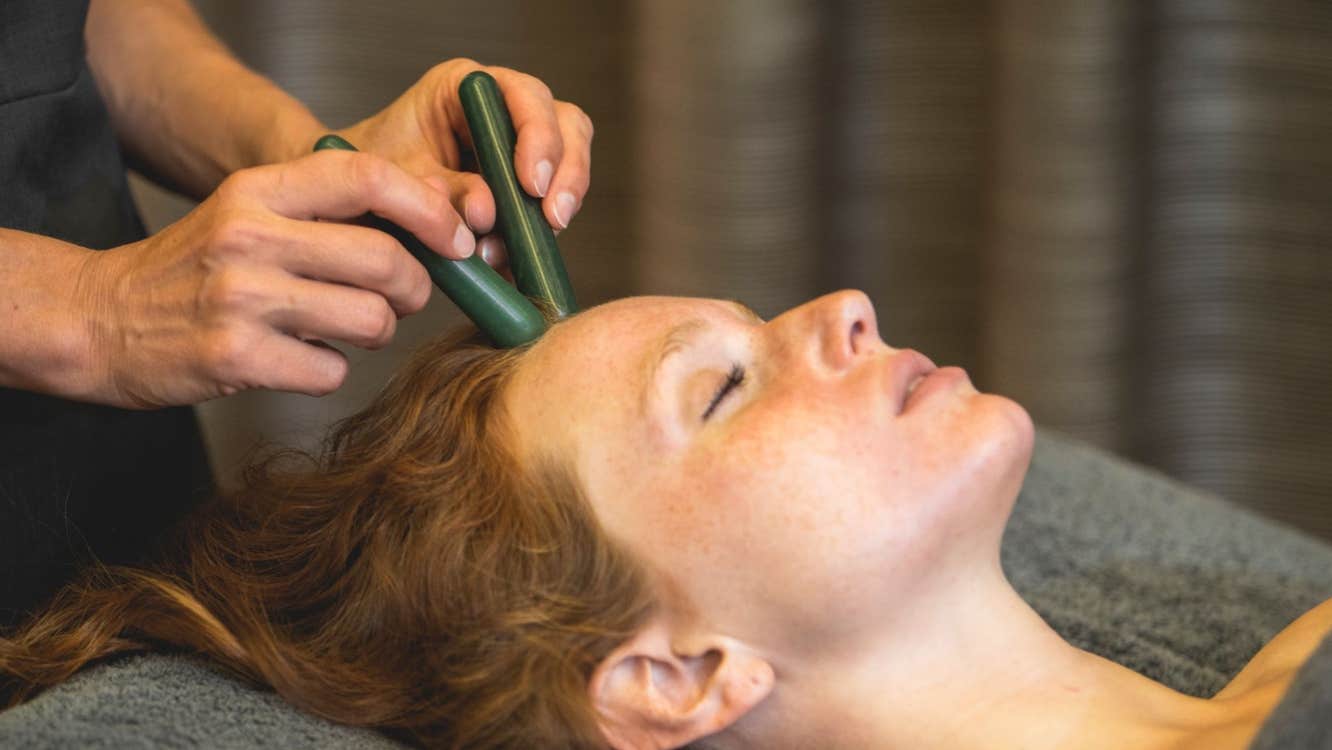 A lady receiving a Gaia facial treatment in the Ciúin Spa at the Slieve Russell Hotel