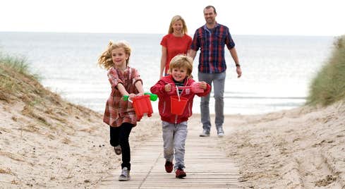 A family playing on Curracloe Beach, Wexford