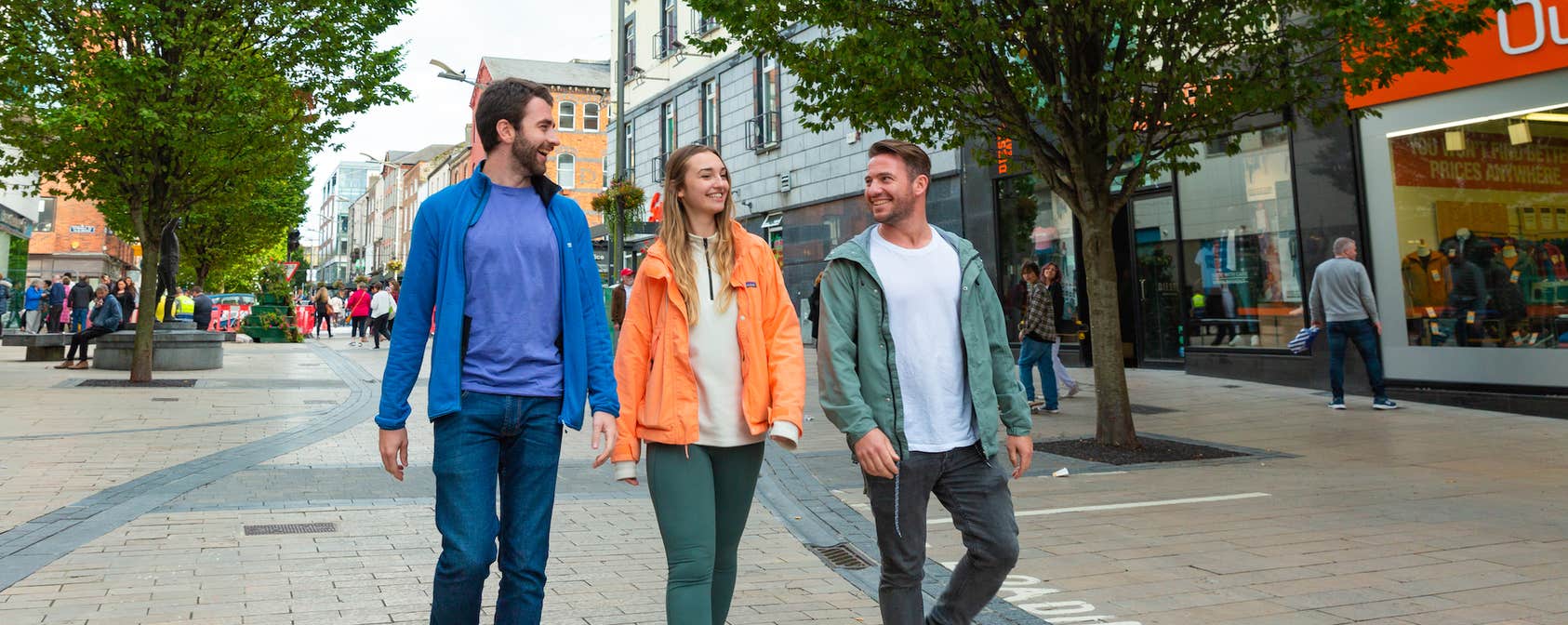 People walking through Limerick city