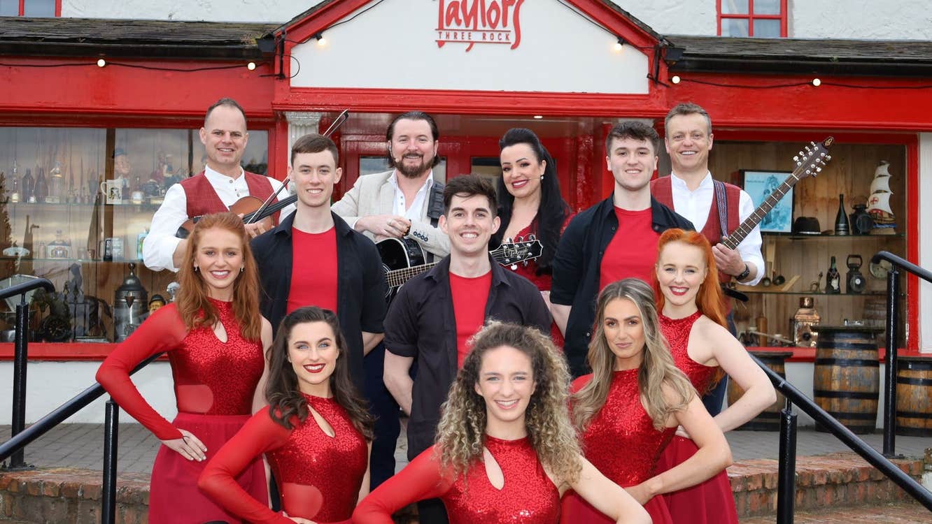 Taylors Three Rock resident band and dancers outside Taylors Three Rock