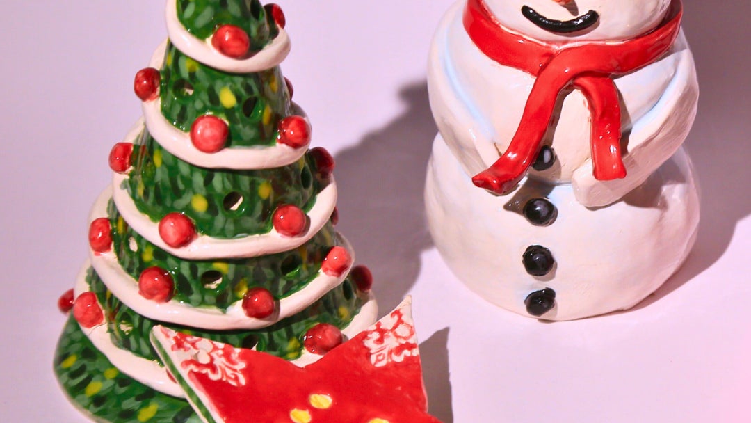 A 3D Christmas tree tealight holder, a 3D snowman decoration and a star shaped hanging tree ornament.