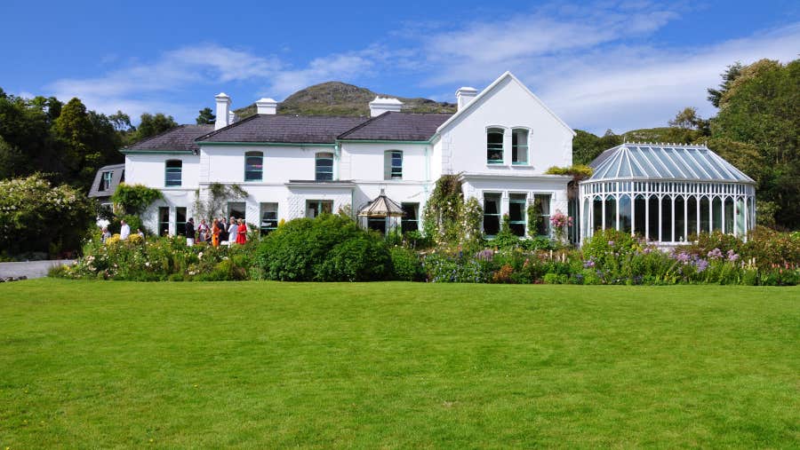 exterior view set in manicured gardens