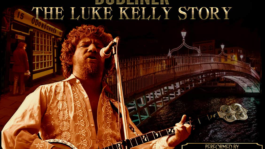 Orange and brown photo of man with curly hair and beard singing and playing a guitar.