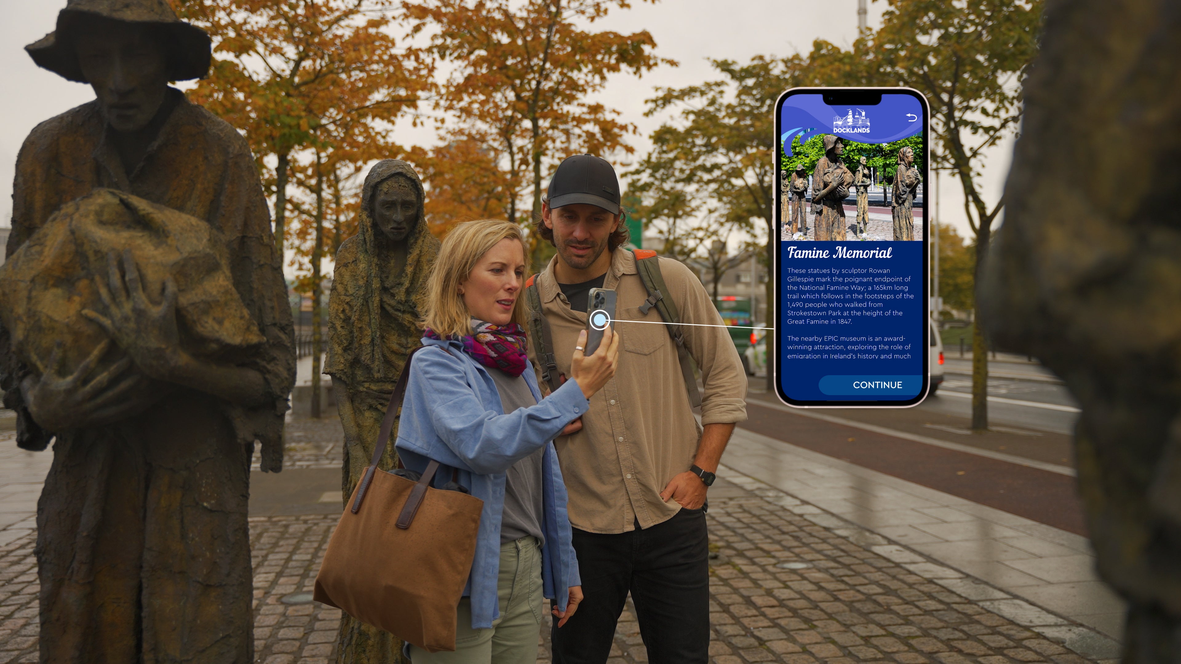 A couple using the app by the Famine Memorial in Dublin City