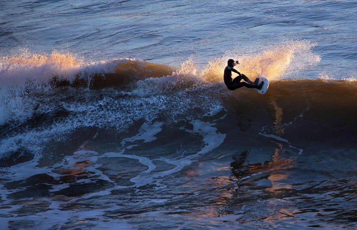 A surfer on Inch Beach in Co Kerry