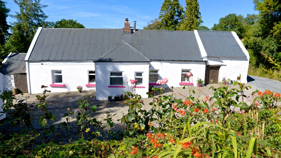 Front view of white cottage