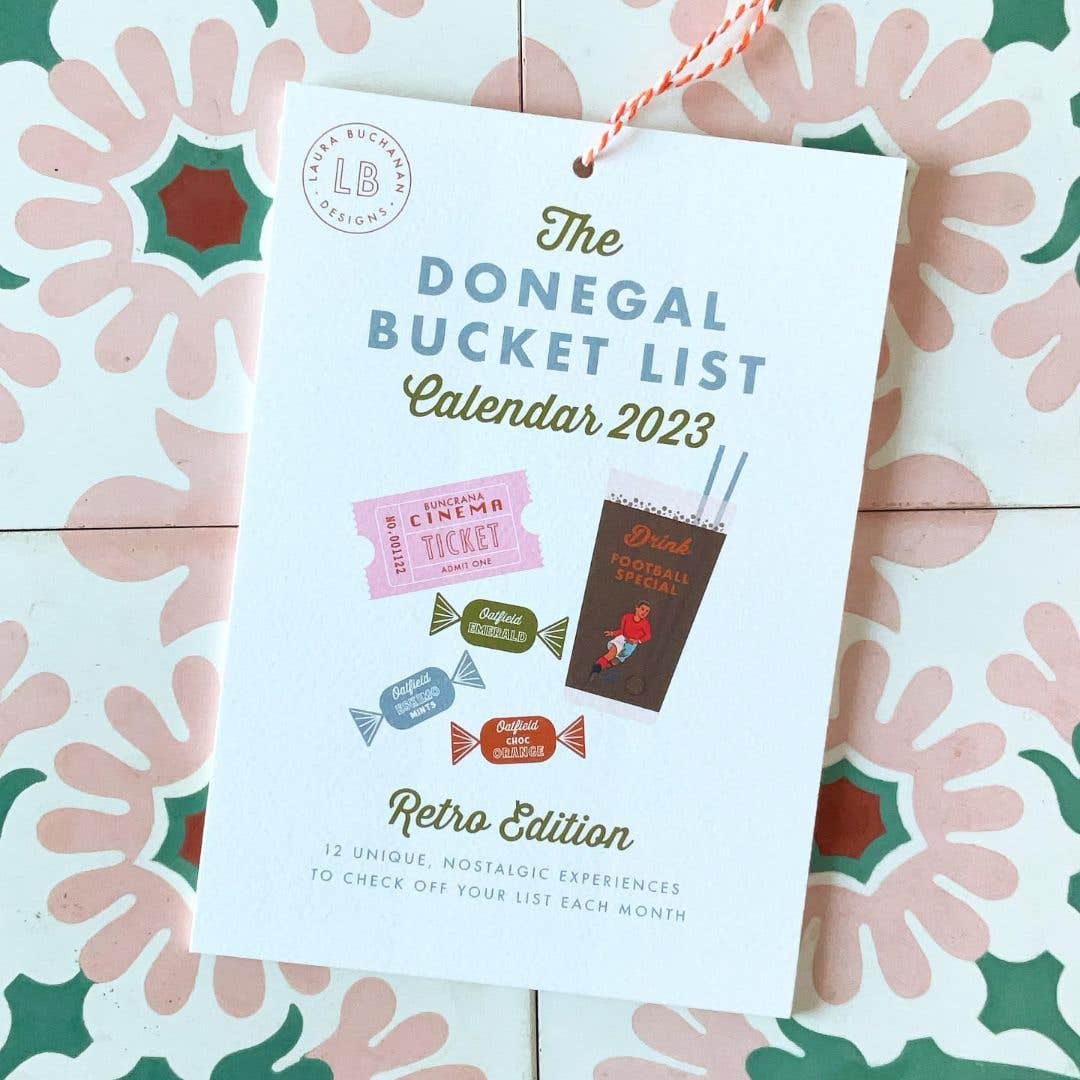 The Donegal Bucket List 2023 calendar on a floral tile background.