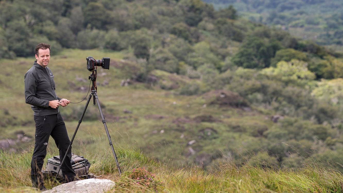 Photographer Norman McCloskey and his camera set up in the Kerry countryside
